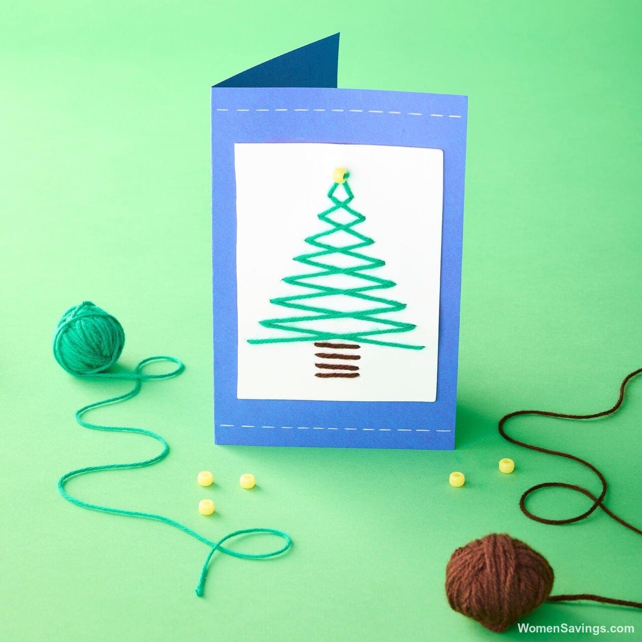 Child making a holiday ornament at a free Michaels Kids Club craft event