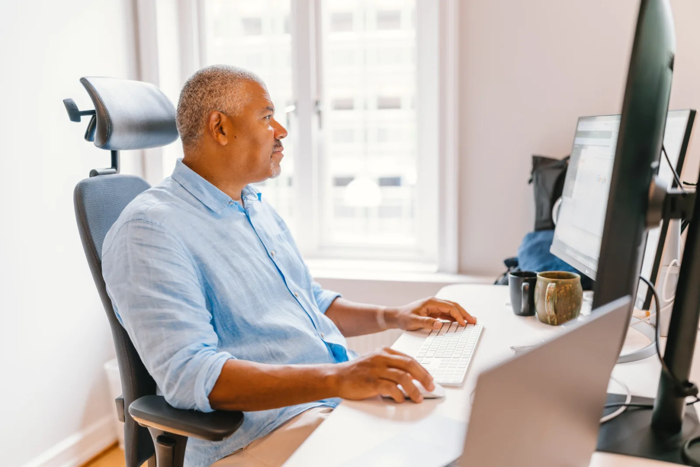 A Colburn developer working with ServiceNow across multiple screens