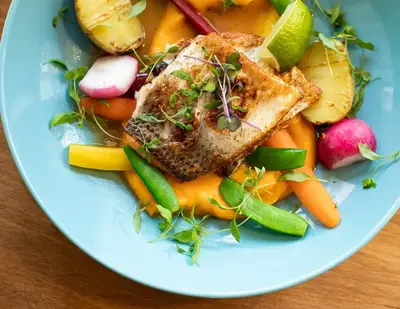 fish with different veggies and potatos