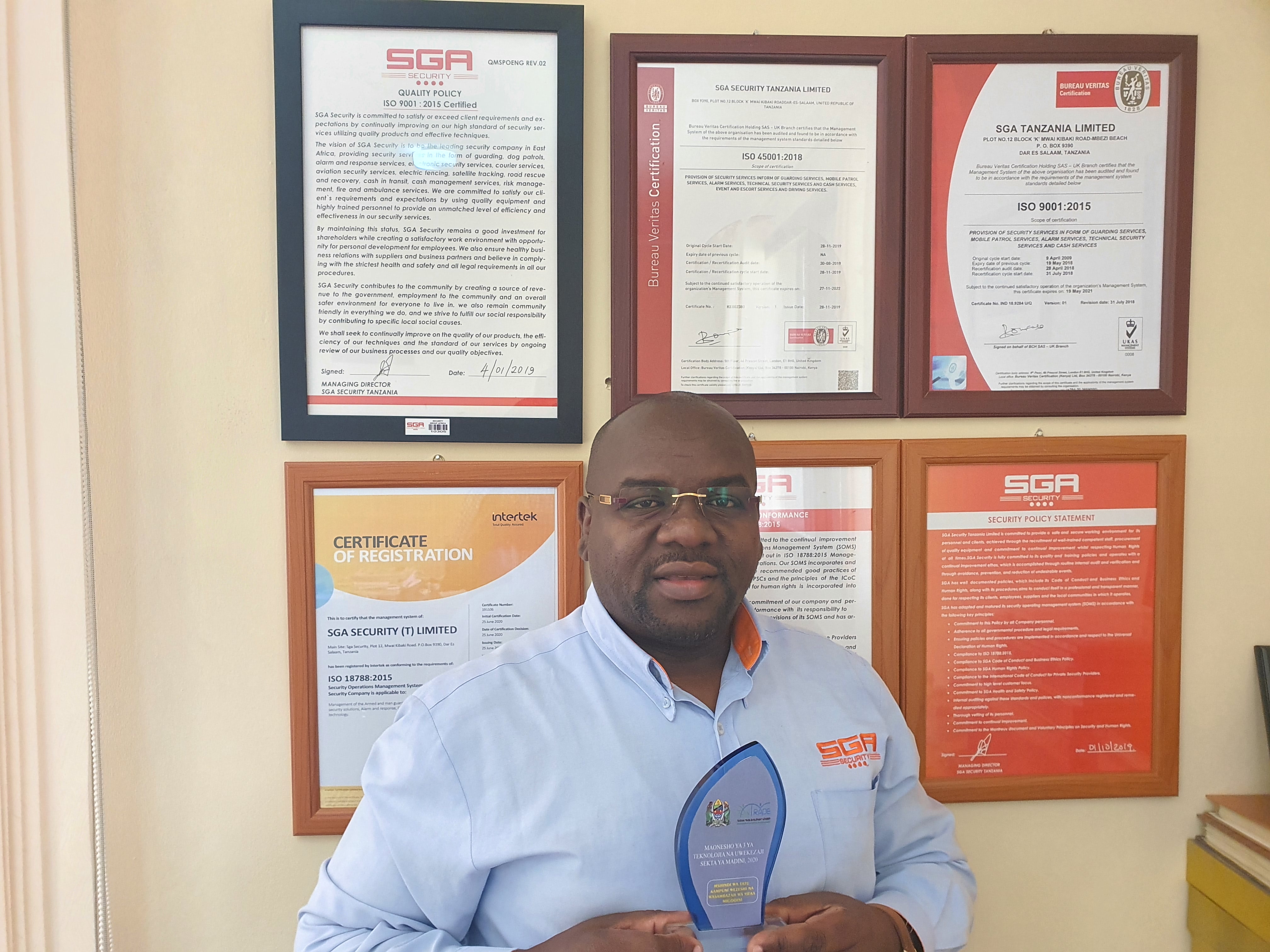 Eric Sambu with Trophy