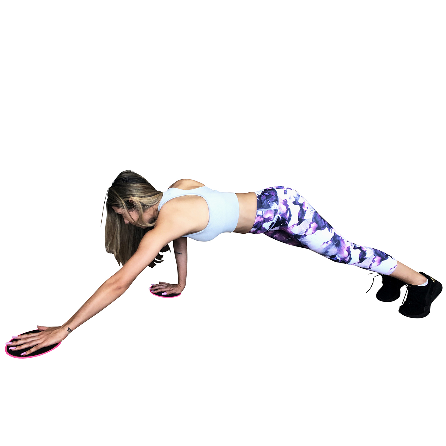 Woman performing a sliding plank exercise using Flexi Muscles core sliders