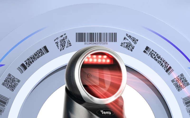 A close-up of a presentation scanner scanning various barcodes and QR codes, showcasing its scanning capabilities.