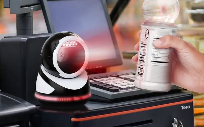 A presentation scanner is scanning a barcode on a drink at a checkout counter, enhancing the shopping experience.