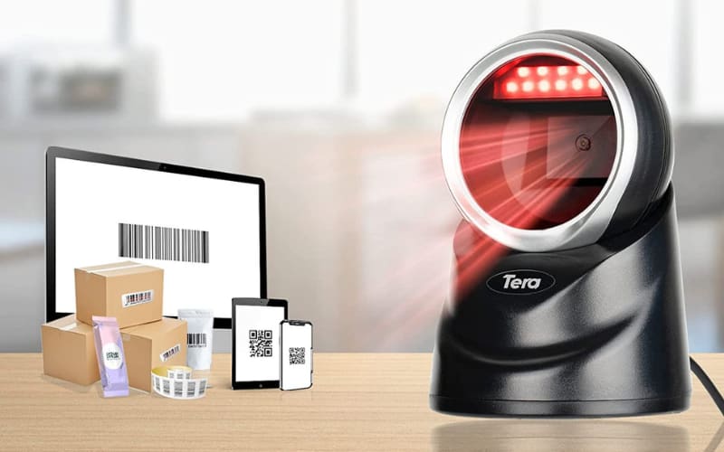 A presentation scanner is positioned next to products, displaying barcodes on screens and devices, showcasing scanning efficiency.