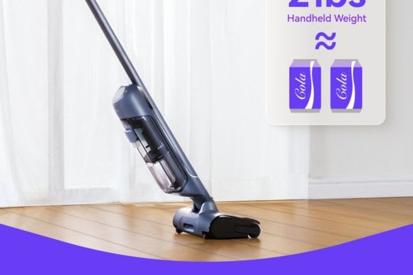 A lightweight vacuum stands ready for use, showcasing its design while highlighting tips on how to clean vacuum brush roll.