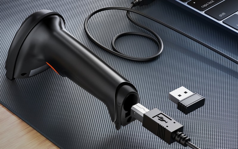 A barcode scanner with USB connection and wireless dongle, showcasing essential scanner accessories for seamless data transfer.