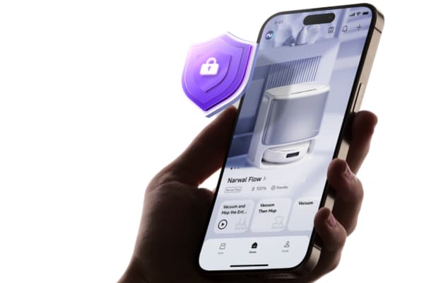 A hand holds a smartphone displaying a robot vacuum app, emphasizing privacy with a lock icon.