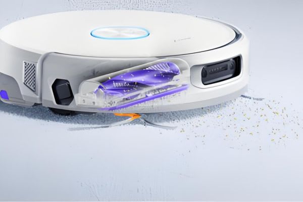 A robot vacuum demonstrates advanced cleaning features, raising the question: can robot vacuums go over threshold?