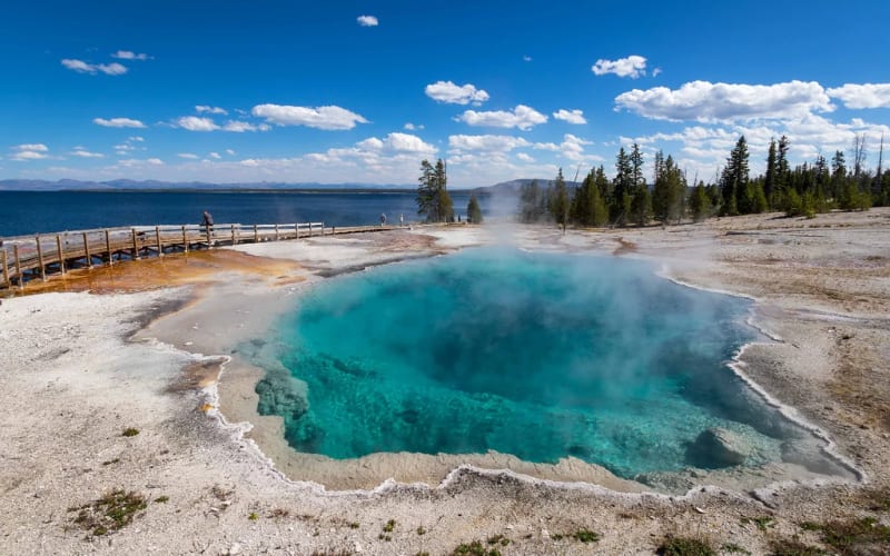 Vibrant geothermal pool at Yellowstone, a perfect spot for stunning views during Yellowstone hikes.