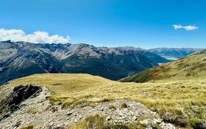 Breathtaking mountain view from a high point, perfect for exploring Yellowstone hikes.