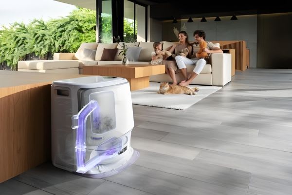 A family relaxes in a modern living room while a robot vacuum utilizes smart hacks for cleaning.