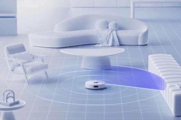 A modern living room featuring a robot vacuum with visual indicators, illustrating how to set up virtual boundaries.