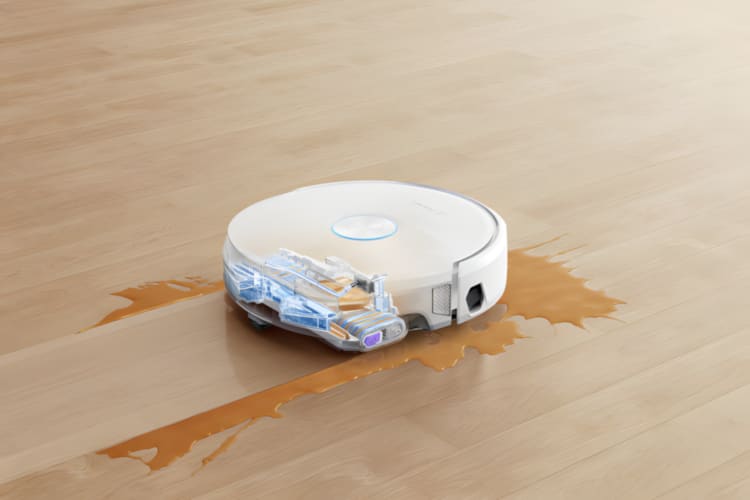 床に spill spilledする液体を掃除するローラーモップが映っています。自動で掃除を進める様子です。