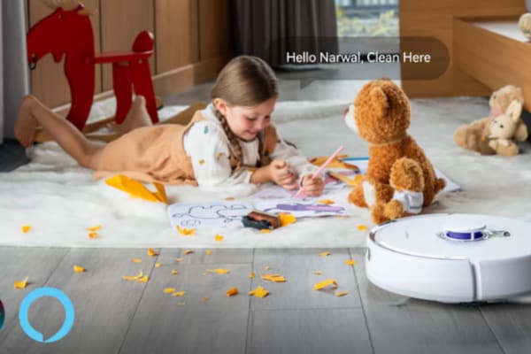 A child draws on a carpet while a robot vacuum cleans nearby, showcasing Robot Vacuums: How to Get the Best Performance on Carpets.
