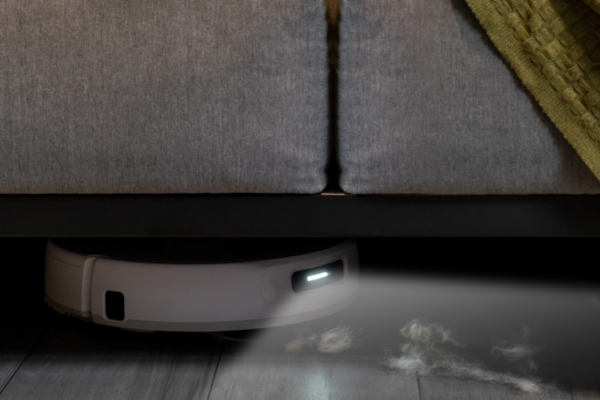 A robotic vacuum cleaner efficiently cleans under furniture, ideal for pet owners seeking the best robot vacuum to avoid pet waste.