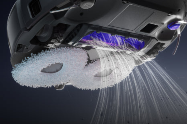 A close-up of a vacuum cleaner's underside, showcasing the beater bar that helps agitate and remove dirt from carpets.