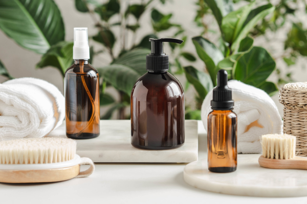 A collection of stylish skincare products and towels ideal for thoughtful Valentine's Day gifts.