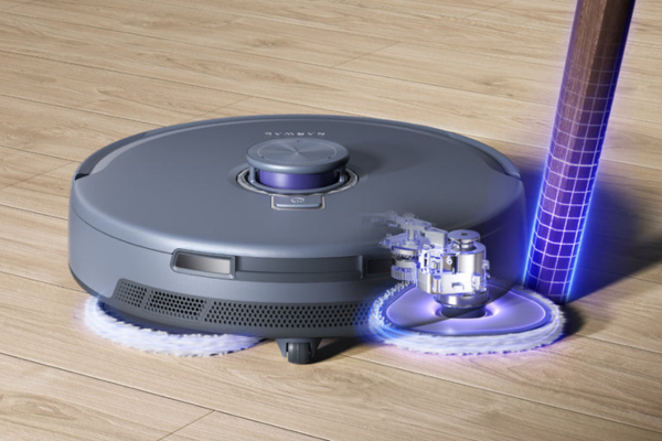 A sleek automatic vacuum cleaner effortlessly gliding across wooden floors, showcasing the best automatic vacuum technology.