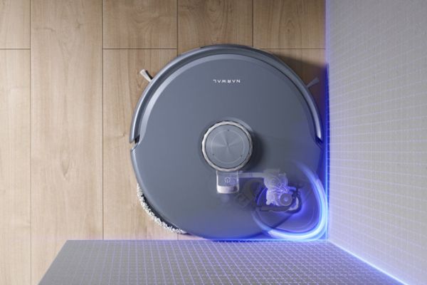 A robot vacuum efficiently cleaning a corner, showcasing the Best Robot Vacuum for Cleaning Corners and Edges technology.