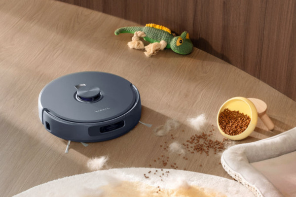 A sleek robot vacuum efficiently cleans up pet hair and sand, making it one of the best robot vacuum for sand.