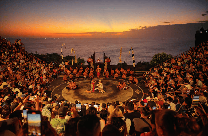 meanwhile, tips watching kecak dance are being performed at uluwatu temple