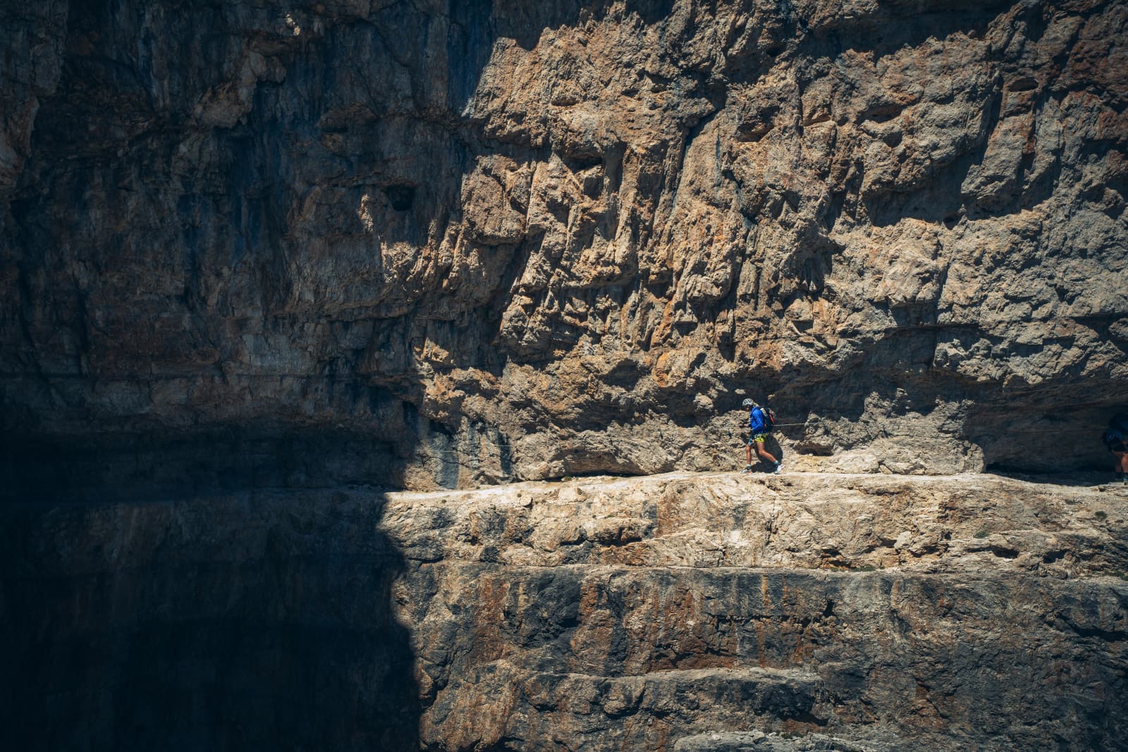 Lone Climber On A Dolomites Ledge