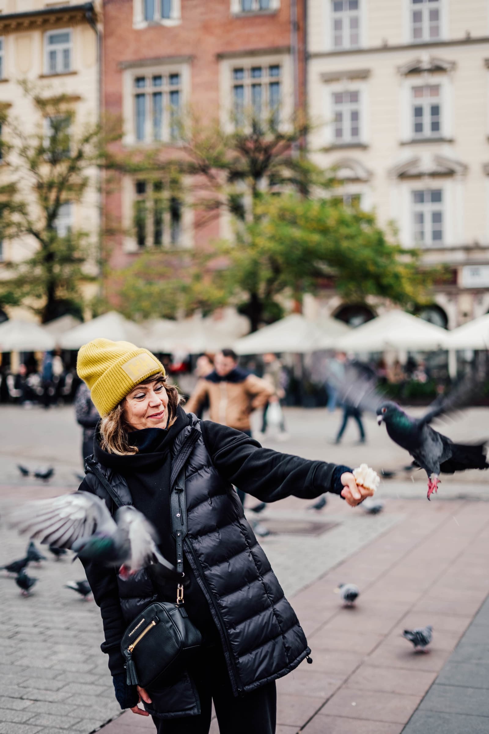 Woman with pigeons