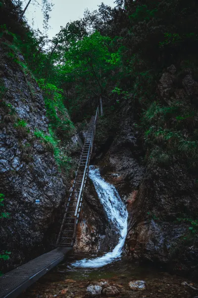 Ladder with a waterfall in Jánošíkové diery