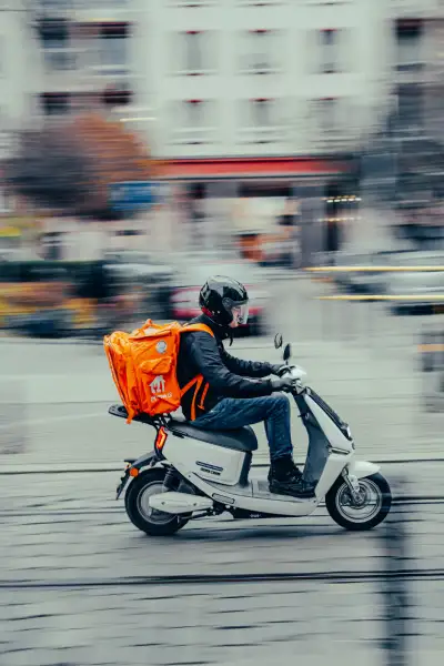 Delivery guy on scooter