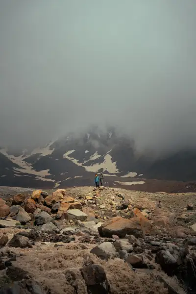 Hikers Crossing the Rocky Moraine