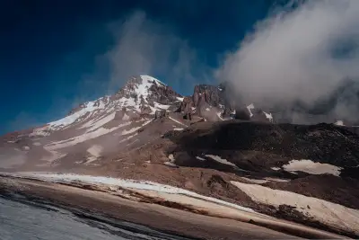 Kazbek Massif Emerging from the Clouds