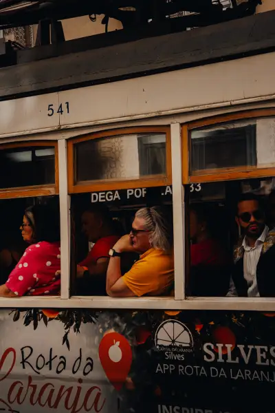Passengers Through the Tram Window