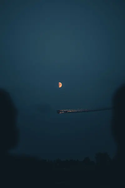 Two people watching night Air Show