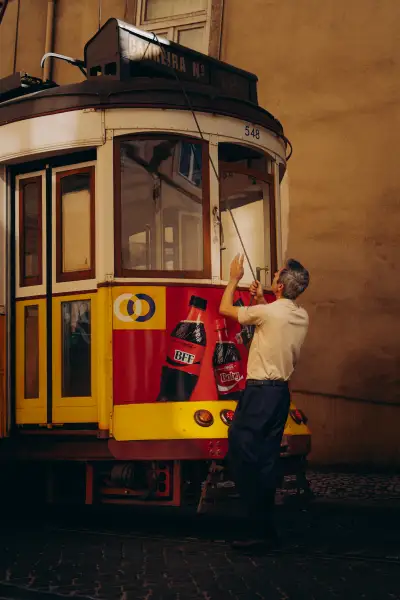 A Tram Operator Adjusting the Pantograph