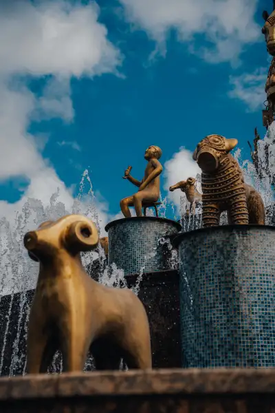 Figures from the Colchis Fountain Against the Clouds, Kutaisi