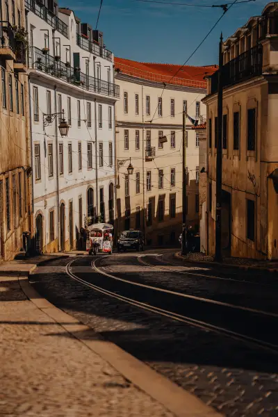Afternoon Light on a Winding Lisbon Street