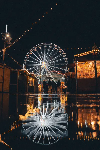 Ferris wheel reflection at Fair