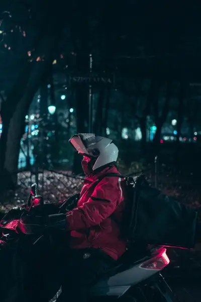 Person on a scooter in the rain