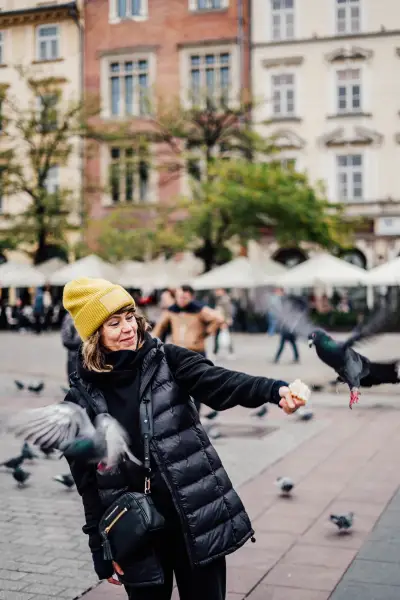 Woman with pigeons