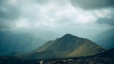 Moody Peak Under Low Hanging Clouds