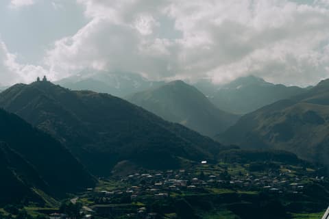 Stepantsminda Village in the Valley