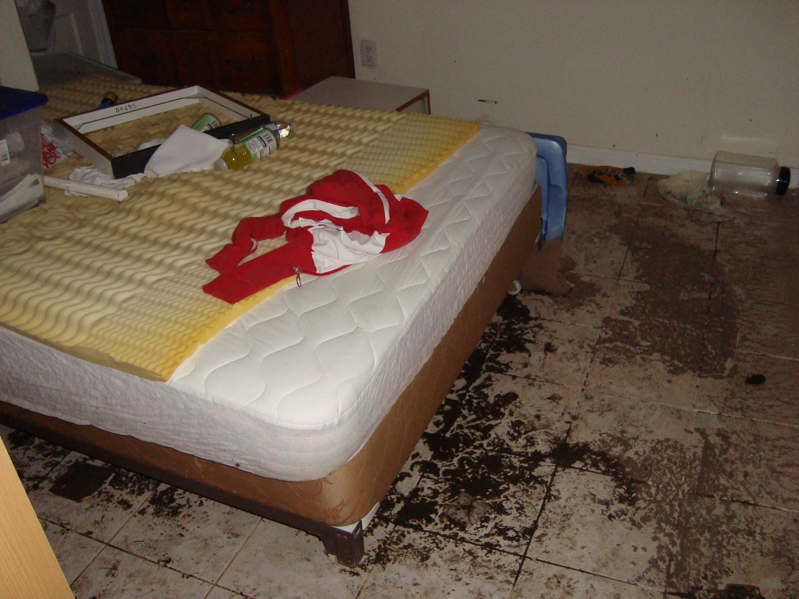 A mattress with junk