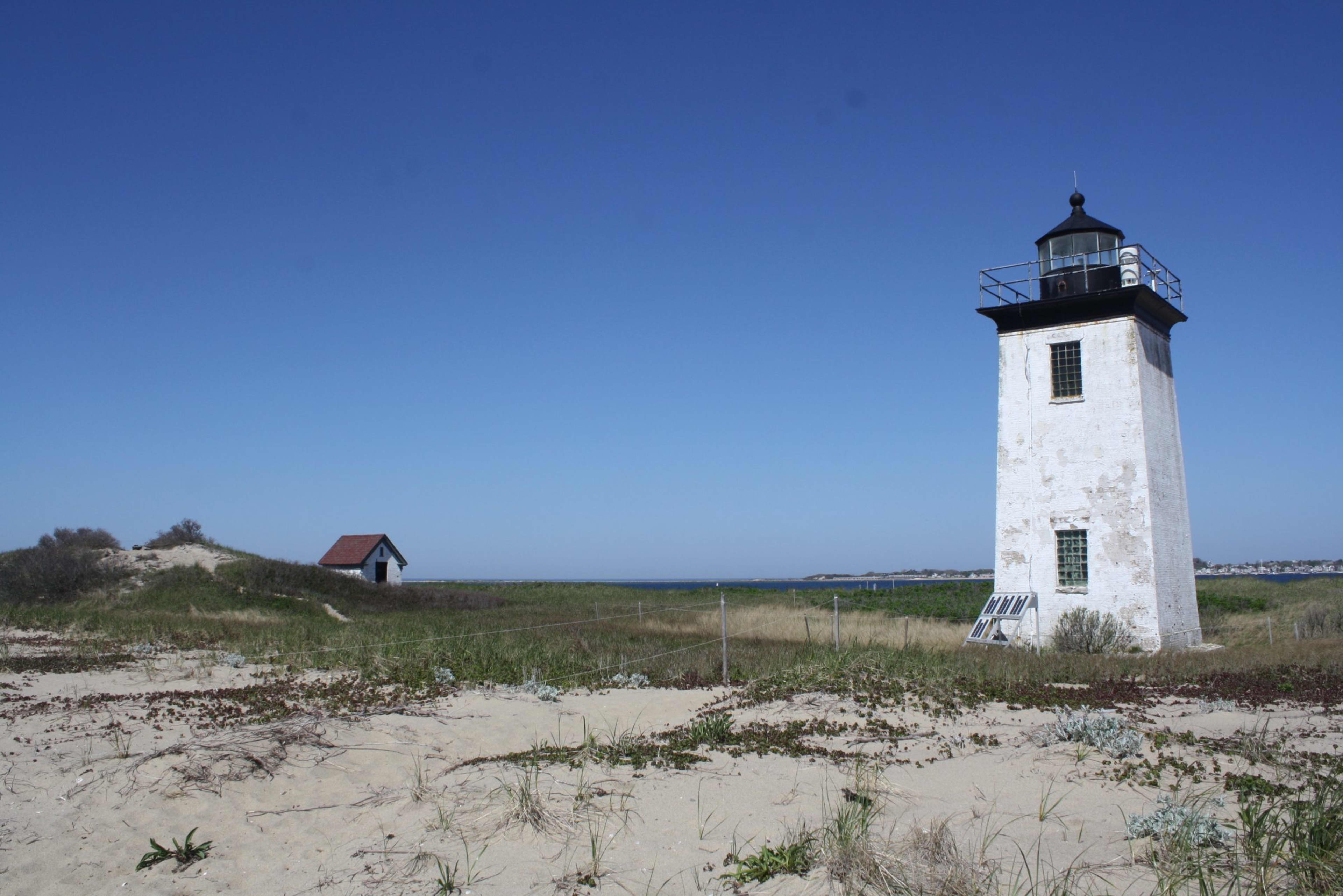 Lighthouse rising from the dunes, Provincetown