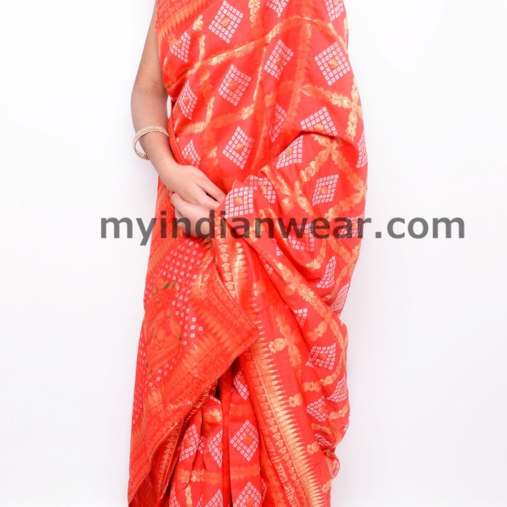 Vibrant Orange Silk Blend Saree with Golden Woven Design - Image 1