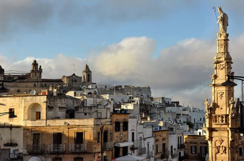 Where are the Apulian cave paintings of the Ostuni inland?