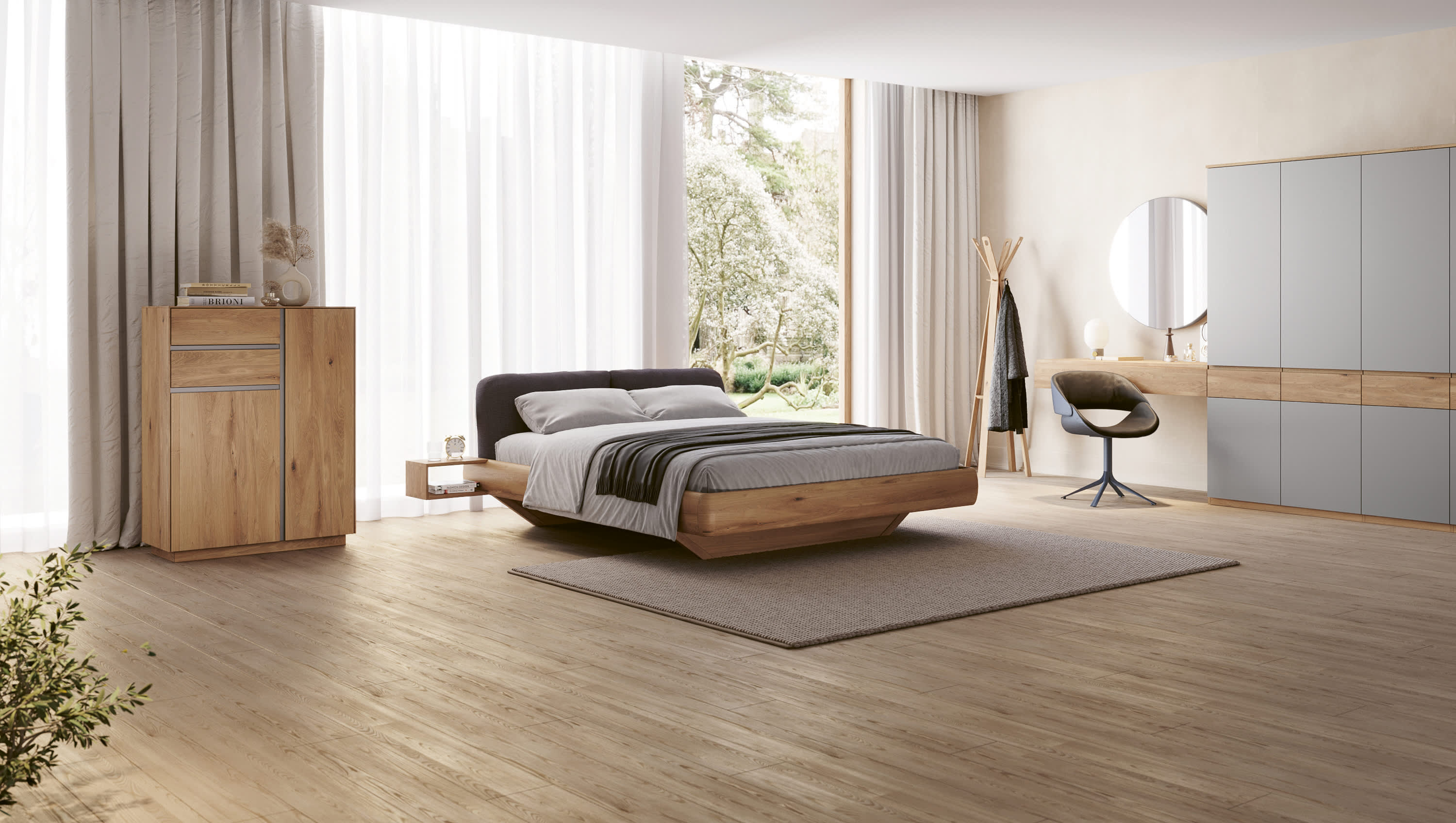 Minimalistisches Schlafzimmer mit dem Schwebebett Wimmer Bett Silvan, großen Fenstern, Holzfußboden und modernen Möbeln. Minimalistisches Schlafzimmer mit dem Schwebebett Wimmer Bett Silvan, großen Fenstern, Holzfußboden und modernen Möbeln.
