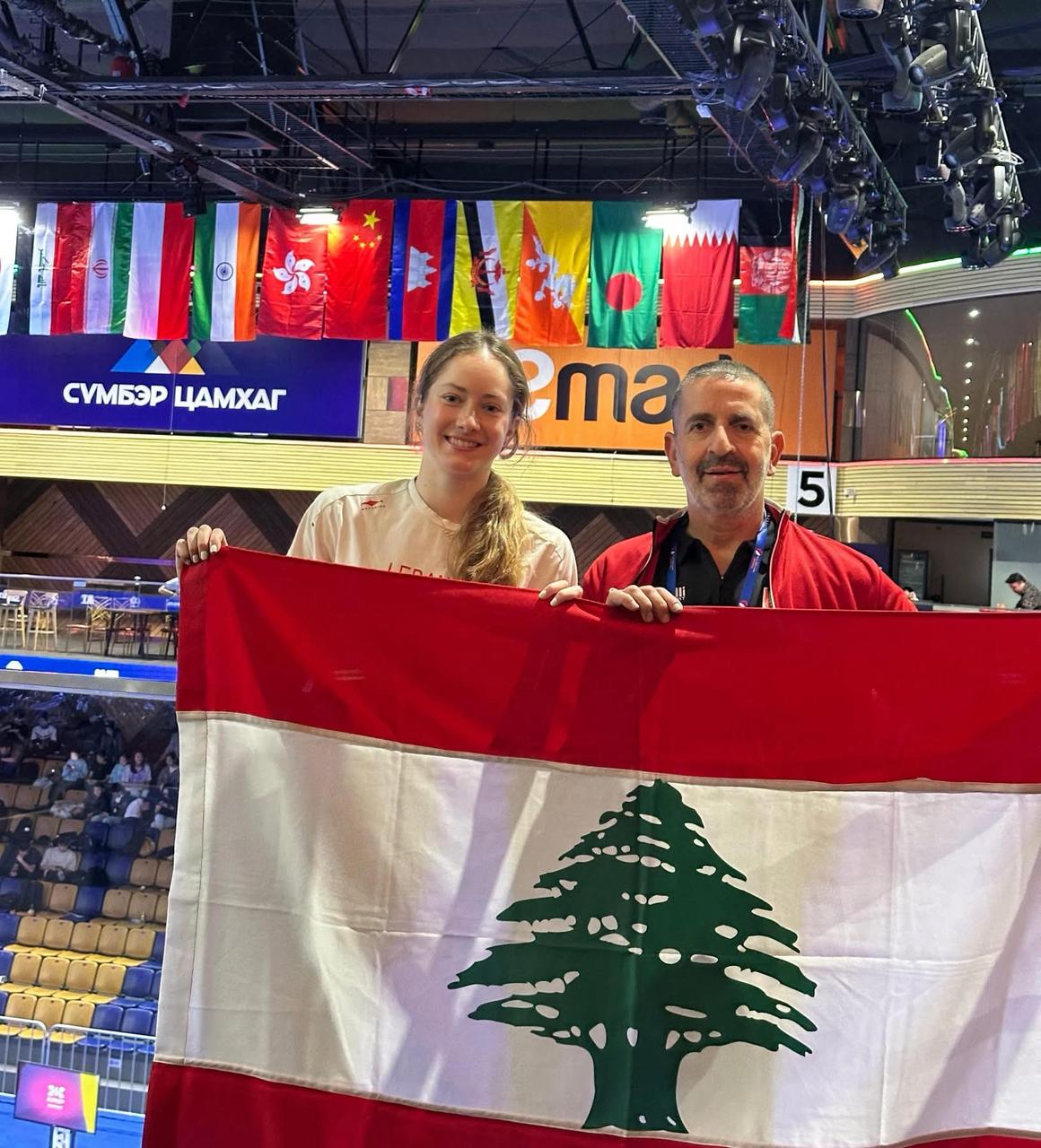 Blog Post Image المدرب ايليا والبطلة عون مع العلم اللبناني في منغوليا