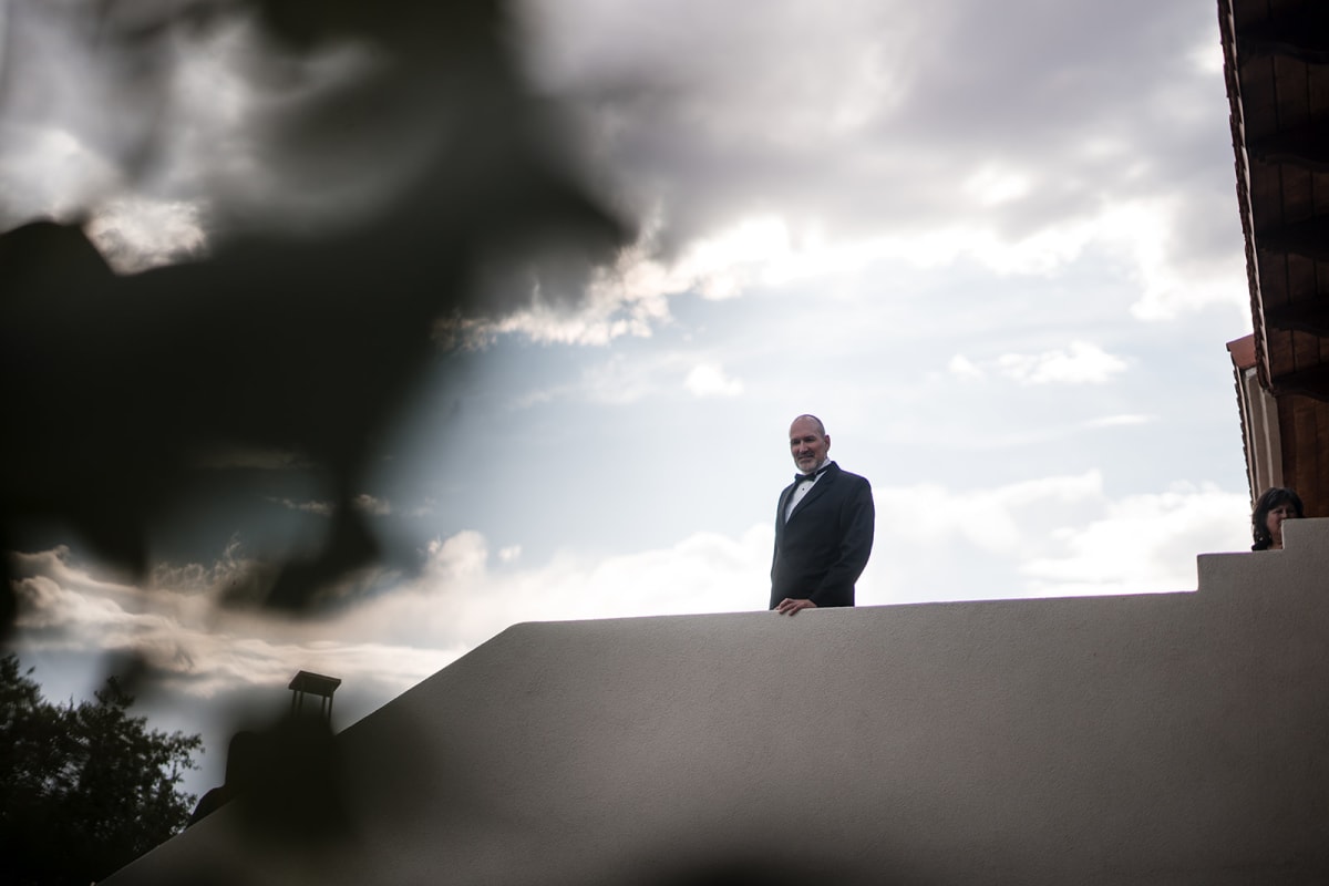 Carlos on the terrace under a summer sky at El Verde Inn