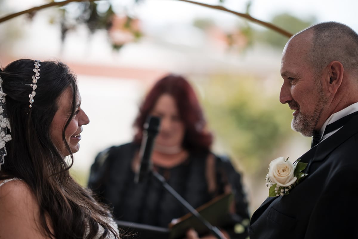 Claudia and Carlos during the ceremony at El Verde Inn