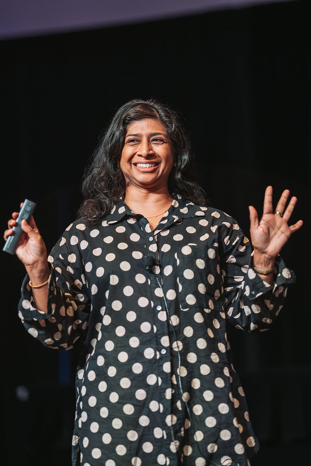Conference keynote speaker on stage at New Mexico event — Casey Addason Photography